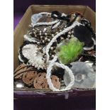 A selection of costume jewellery including shell necklace, bangles etc