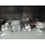 A selection of clear cut crystal glass wares including cranberry etched