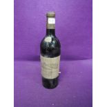 A 1955 bottle of Grand Vin Chateau Calon Segur, Saint Estephe