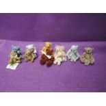 Eight miniature Catherine White jointed bears, heights 1- 3 inches and four similar miniature bears,