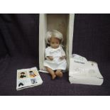 A Sasha doll, Gregor Baby Blonde wearing nightdress 503 in original box
