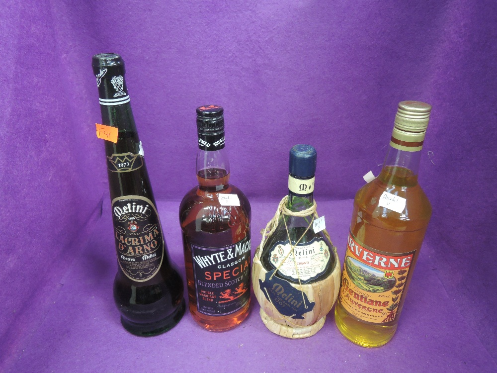 A bottle of Whyte & MacKay Special blended scotch whisky 1L 40%, a bottle of Melini Chianti, a