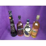 A bottle of Whyte & MacKay Special blended scotch whisky 1L 40%, a bottle of Melini Chianti, a