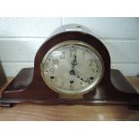A mantle clock with mahogany body and chime Presented to Inspector Duckworth of Barrow in Furness