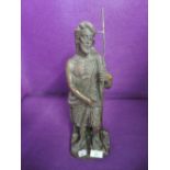 A heavy set and cast brass or similar religious shepherd figure possibly of Jesus in a Greco