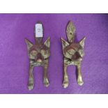 A pair of brass cast door knocker in the form of a fox possibly hunt related