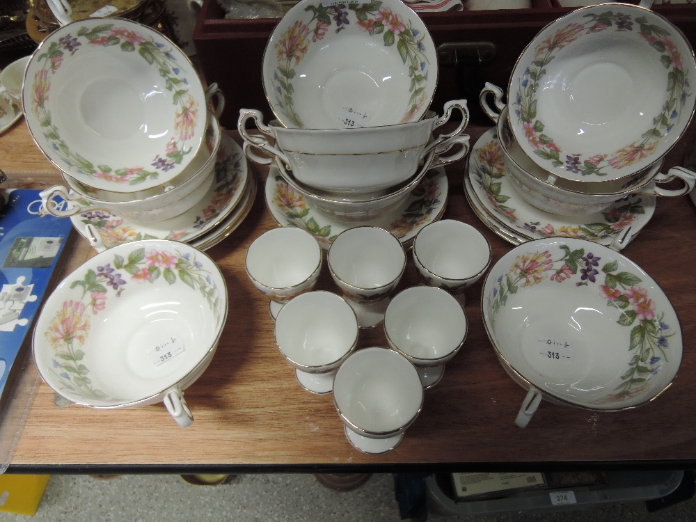 A selection of soup bowls and saucers by Paragon