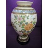 An oriental Chinese style vase bearing mark to base with enamel bird of paradise decoration