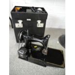 A sought after sewing machine by Singer electric motor with casing Cat. No. CAK 6 12