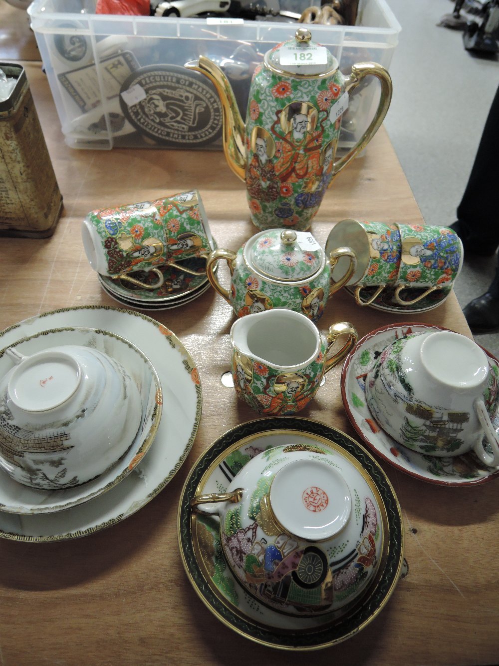 A selection of oriental ceramics teacups and saucers etc