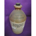 An advertising salt glazed flagon for Stantons Accrington