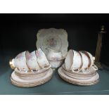 A part tea service by Tuscan China in a pink and gilt design