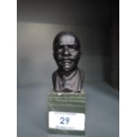 A small size figural bust or head of Soviet leader Vladimir Lenin dated 1972 on marble base