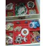 A selection of modern costume jewellery including brooches, rings and necklaces etc