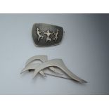 Two white metal brooches including Mexican silver modelled as stylised birds and 1970's stylised