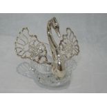 A cut glass and silver swan shaped trinket box having pierced moulded moveable wings