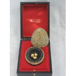 A cased Stuart Devlin silver gilt surprise egg for year 1971, Limited edition, containing an