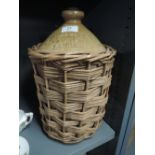 A saltglazed flagon in basket W Wilkinson, Lancaster