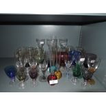 A selection of colour glass wares including posy vase and goblets