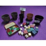 A box of dice, shakers and tokens