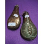 Two copper powder flasks