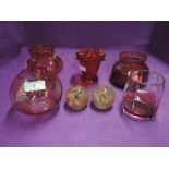 A selection of colour glass ware including ruby red and pink and named Dartington