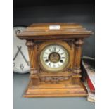 A bracket clock with enamel face marked H.A.C and made in Wurttemberg