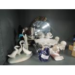 A selection of figures and figurines including Nao and Cherub pair