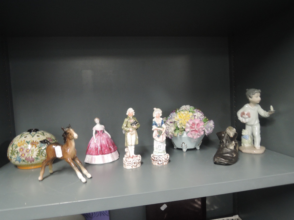 A selection of figures and figurines including Beswick horse