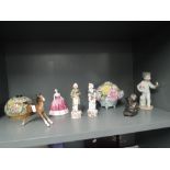 A selection of figures and figurines including Beswick horse