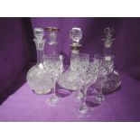 A selection of fine cut glass decanters and wine glasses