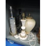 A selection of table lamps and lights with various designs and styles