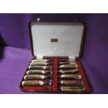 A set of steak knifes and forks by Mclean of Braemar Scotland