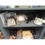 A selection of vintage telephones in various designs and styles