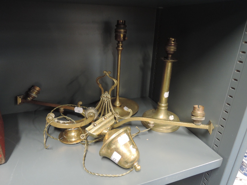 A selection of brass cast and similar lights and lamps including drop flex