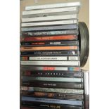 A box of compact discs, U2, Ryan Adams and many more