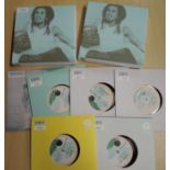 A lot of Bob Marley 45's and cd box set - as new condition - unplayed