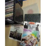 A lot of sixty seven inch singles - some pic sleeves and company bags - good online seller or shop