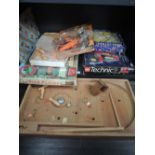 A shelf of mixed toys including Lego Technics part set 8854, Farm Play Set, Bagatelle etc