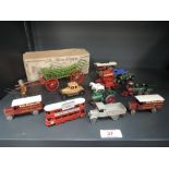 A Britains lead 'the Farm Wagon in green with red wheels with Farmer in original box along with