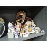 A selection of mainly modern decorative ornaments including delftware