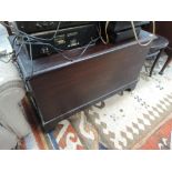 A vintage dark stained blanket box