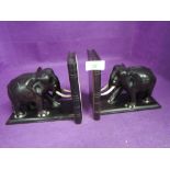 A pair of elephant book ends