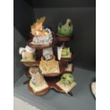 A 1980's Franklin Porcelain display stand with Woodland Surprises animal figures