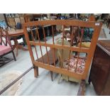 An early 20th Century Arts and Crafts style oak bedframe