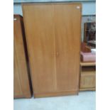 A vintage golden oak wardrobe by Stag