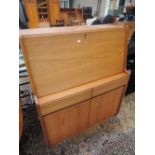 A vintage teak bureau