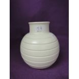 A Wedgwood signed Keith Murray vase in cream