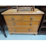 A Victorian stained pine chest of two over three drawers