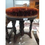 A Victorian stained frame piano stool